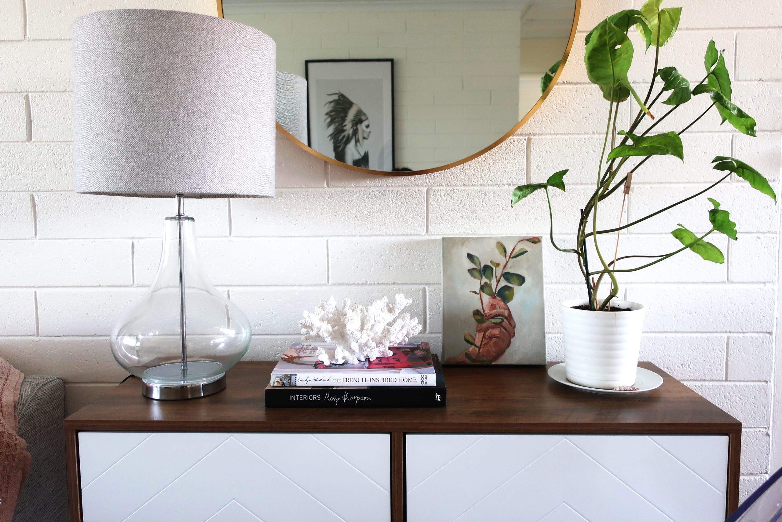 Camden Apartment Boho Style Interior with art plant and lamps